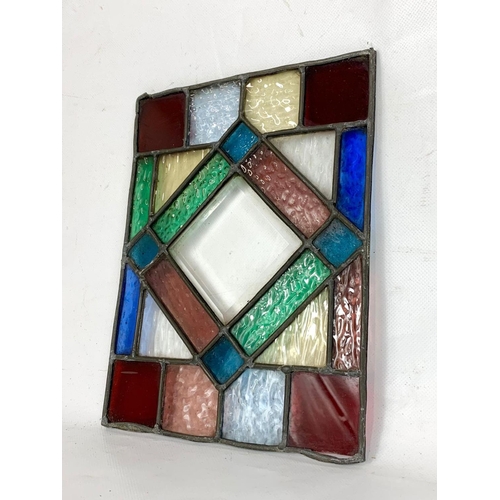 32 - A set of 4 Victorian stained and lead glass panels. 19 x 24.5cm