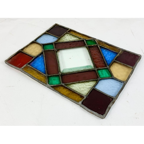 32 - A set of 4 Victorian stained and lead glass panels. 19 x 24.5cm