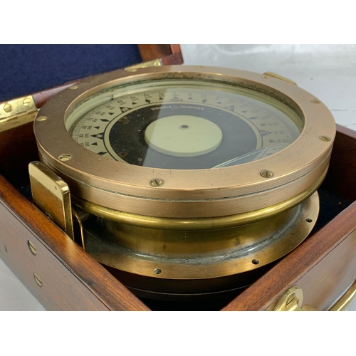 33 - An early 20th century Ships Compass by Dobbie McInnes LTD Glasgow in a mahogany case. Case measures ... 