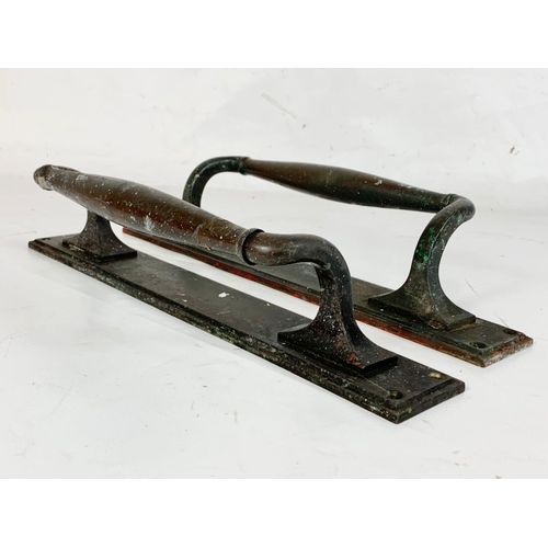 35 - A pair of large early 20th century brass door handles. Circa 1920. 36cm.