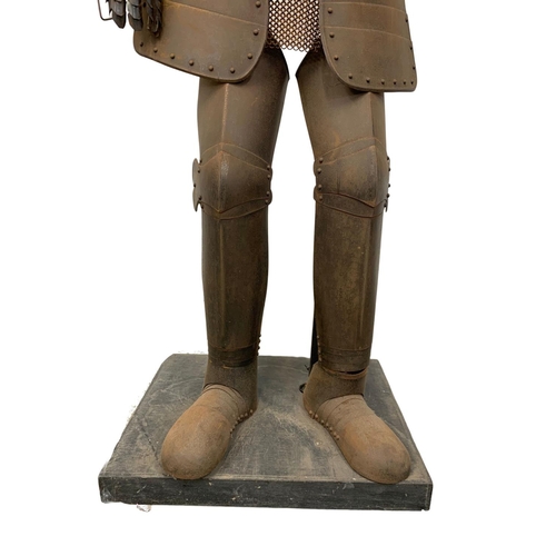 353 - A life size Medieval style Knight’s armour on stand. 187cm