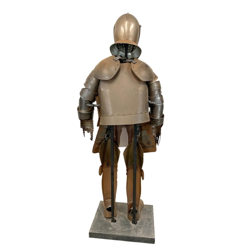 353 - A life size Medieval style Knight’s armour on stand. 187cm