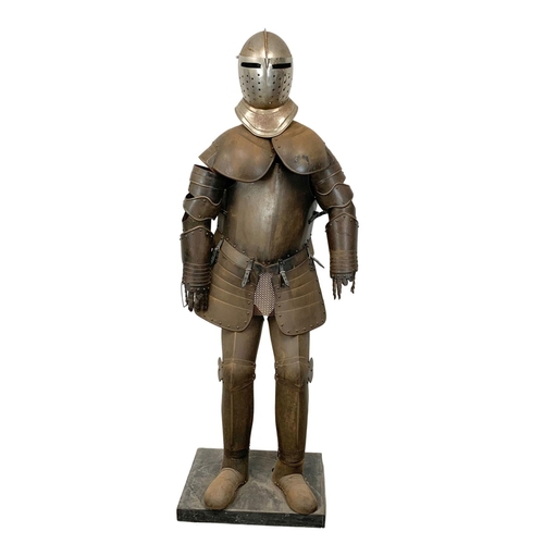 353 - A life size Medieval style Knight’s armour on stand. 187cm