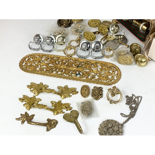 361 - A quantity of brass handles etc.