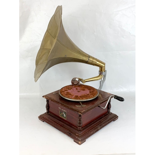 363 - An old style gramophone. His Masters Voice. 37.5 x 37.5 x 71cm.