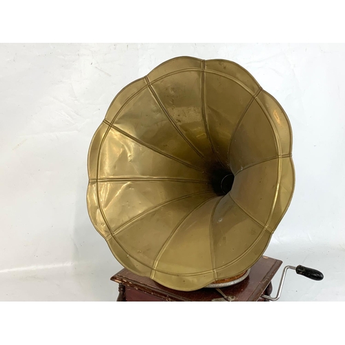 363 - An old style gramophone. His Masters Voice. 37.5 x 37.5 x 71cm.