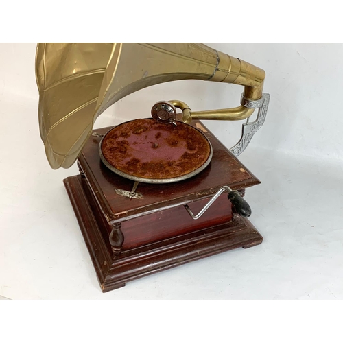 363 - An old style gramophone. His Masters Voice. 37.5 x 37.5 x 71cm.