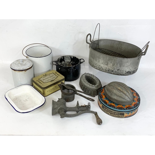 368 - A quantity of vintage baking equipment, a Lyon’s tin, enamel ware etc.