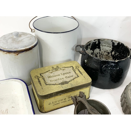 368 - A quantity of vintage baking equipment, a Lyon’s tin, enamel ware etc.