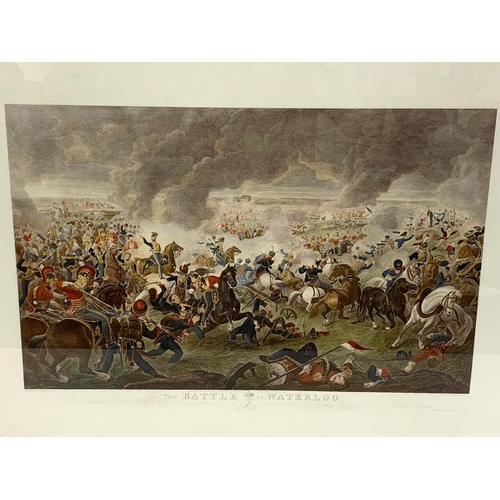 386 - A large print of The Battle of Waterloo in a gilt frame. 103 x 72cm