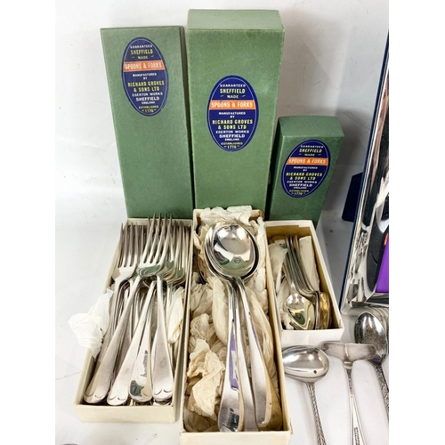 407 - A quantity of cutlery and other tableware. Including silver plated cutlery sets in boxes, Arthur Pri... 