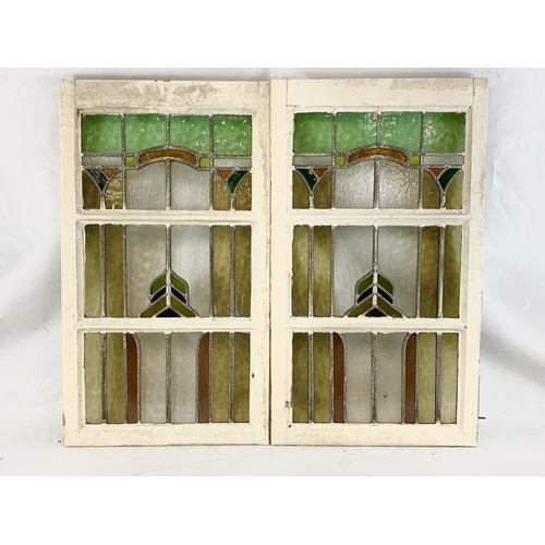 41 - A pair of large Victorian stained glass panels in wooden frames. 50 x 88cm