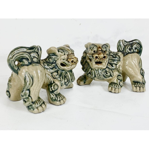 411 - A pair of vintage Chinese pottery Foo Lions, 13cm x 9cm