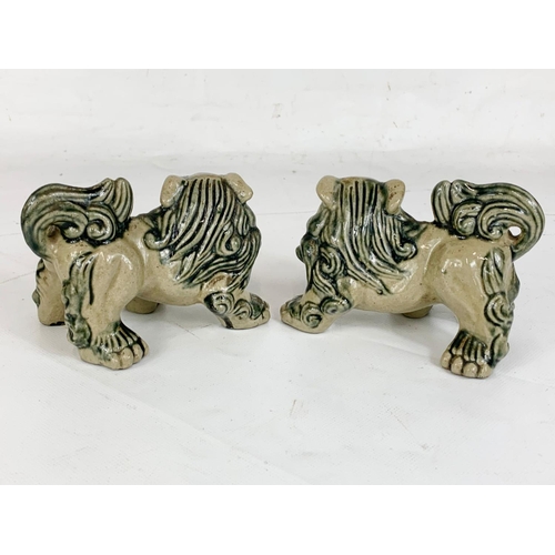 411 - A pair of vintage Chinese pottery Foo Lions, 13cm x 9cm