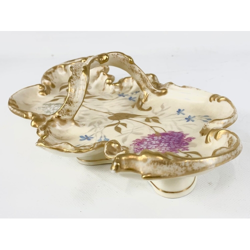 425 - A late 19th century Rococo style porcelain dish by Limoges France. G.D & C. Made for R. Hogg & Co Be... 