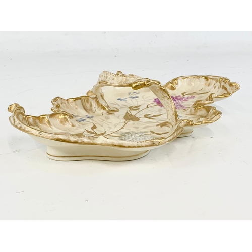 425 - A late 19th century Rococo style porcelain dish by Limoges France. G.D & C. Made for R. Hogg & Co Be... 