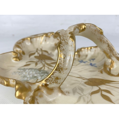 425 - A late 19th century Rococo style porcelain dish by Limoges France. G.D & C. Made for R. Hogg & Co Be... 