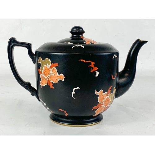 428 - A late 19th early 20th century Carlton Ware Chinese design teapot, 24cm x 16cm