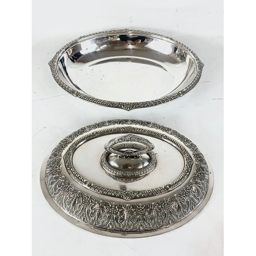 438 - A pair of good quality late 19th century ornate silver plated food servers. 31.5cm.