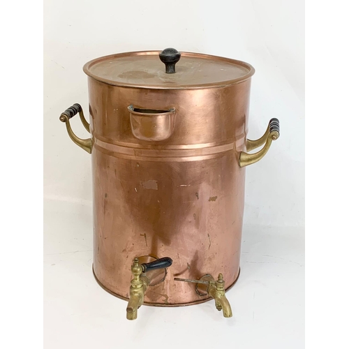 44 - A very large early 20th century copper dispenser with stoneware lining. Circa 1900. 50.5 x 53 x 56cm