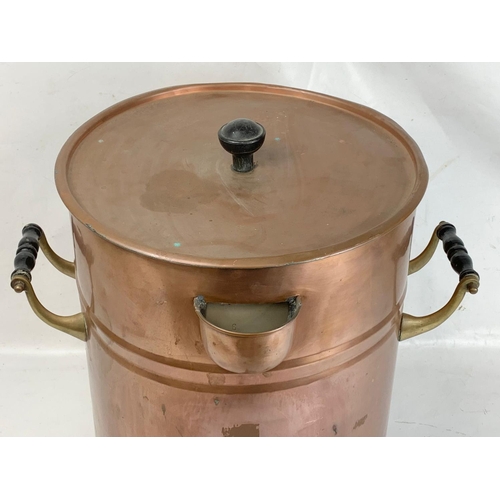 44 - A very large early 20th century copper dispenser with stoneware lining. Circa 1900. 50.5 x 53 x 56cm