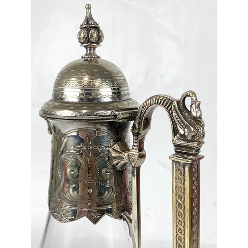 440 - A quality late 19th century ornate silver plated and crystal claret jug. 31.5cm