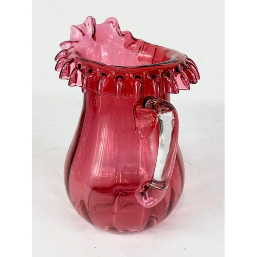 442 - A large Victorian Ruby Glass jug, 21.5cm