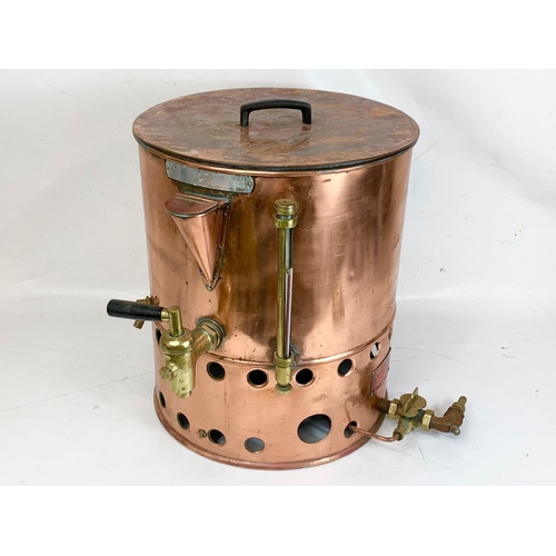 45 - A large vintage copper dispenser. 51 x 48 x 51cm.