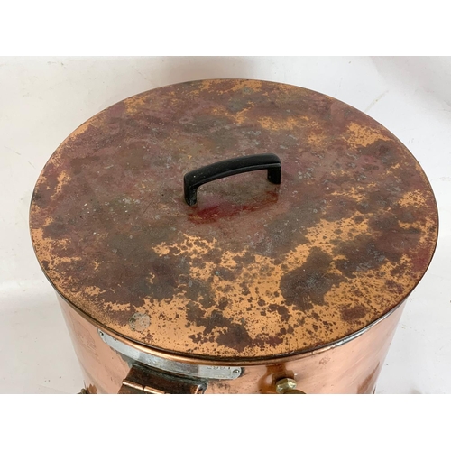 45 - A large vintage copper dispenser. 51 x 48 x 51cm.