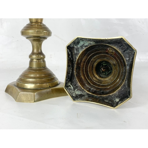 455 - A pair of large Victorian brass candlesticks. 26.5cm.