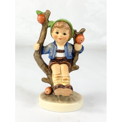 464 - An M. J. Hummel Goebel pottery figure in box “Apple Tree Boy” 142 3/0. Germany. Figure measures 11cm