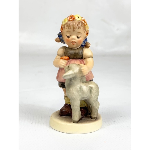 492 - An M. J. Hummel Goebel pottery figurine “Springtime Friends” 2218. 2000. Germany. 8.5cm.