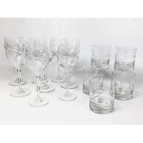 509 - 2 sets of matching wine and whisky crystal glasses.