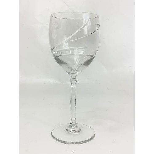 509 - 2 sets of matching wine and whisky crystal glasses.