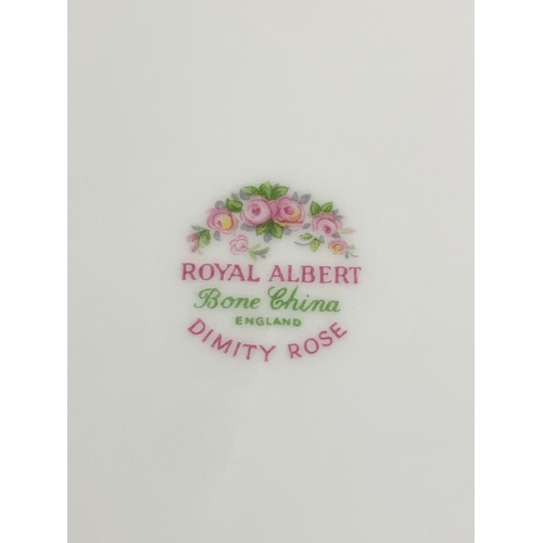 556 - A set of 6 Royal Albert “Dimity Rose” dinner plates. 26cm