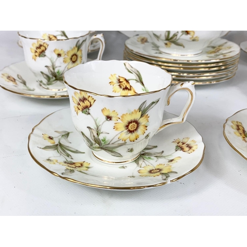 570 - A 21 piece Crown Staffordshire tea set