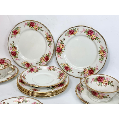 587 - A 17 piece Old Foley “Garland Rose” dinner service. Soup bowls, salad and side plates. James Kent LT... 