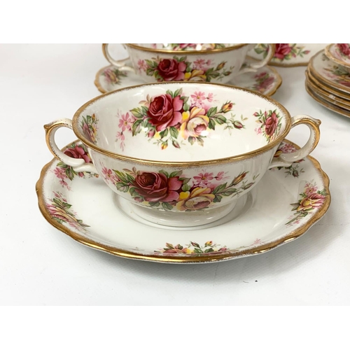 587 - A 17 piece Old Foley “Garland Rose” dinner service. Soup bowls, salad and side plates. James Kent LT... 