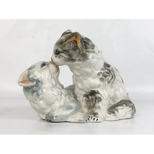 591 - An Italian pottery cat. 25cm.