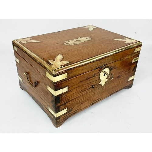 6 - A 19th century Anglo Indian brass bound and teak stationary box, circa 1860. 32.5cm x 26cm x 18cm