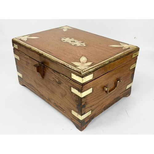 6 - A 19th century Anglo Indian brass bound and teak stationary box, circa 1860. 32.5cm x 26cm x 18cm