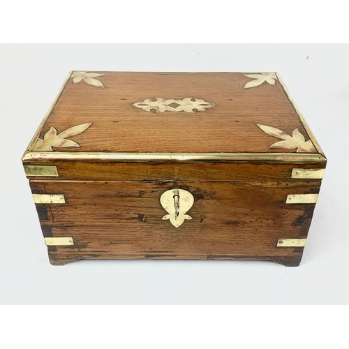 6 - A 19th century Anglo Indian brass bound and teak stationary box, circa 1860. 32.5cm x 26cm x 18cm