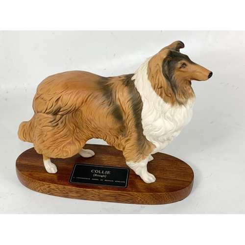 631 - A large Beswick pottery Collie dog on stand. 24 x 20.5cm