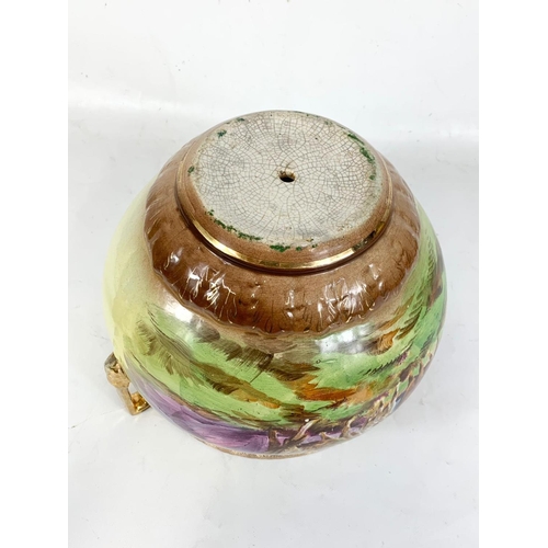 634 - A late Victorian pottery jardiniere. 31 x 23cm.