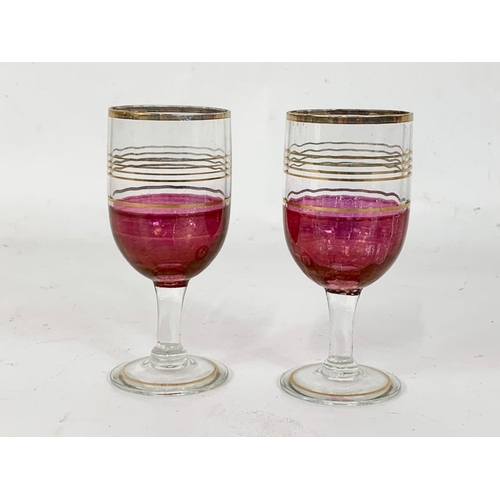 646 - 3 pieces of vintage Ruby Glass. An Art Glass bowl 20.5 x 8cm, and a pair of drinking glasses 10cm