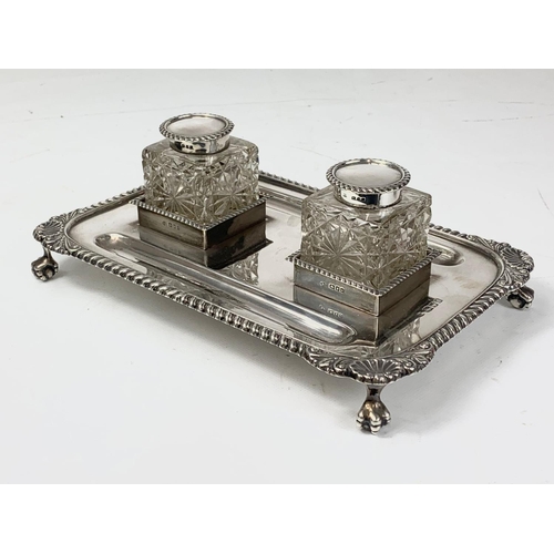 653 - An early 20th century silver pen and ink stand.  London 1919, 552gms.  Not including bottles and lid... 