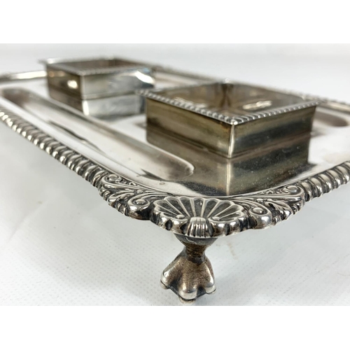 653 - An early 20th century silver pen and ink stand.  London 1919, 552gms.  Not including bottles and lid... 