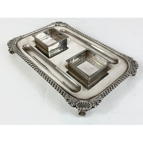 653 - An early 20th century silver pen and ink stand.  London 1919, 552gms.  Not including bottles and lid... 