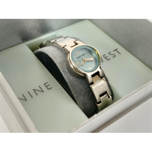 660 - A ladies Nine West watch in box