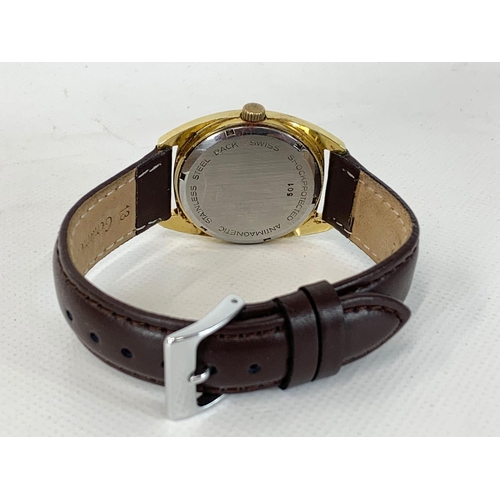 669 - A gents Buren Hamilton gold plated watch.